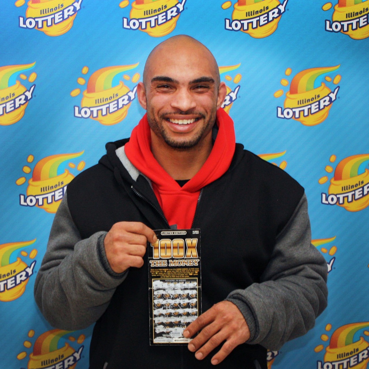 Jesus DeLeon holds his winning 100X The Money ticket.